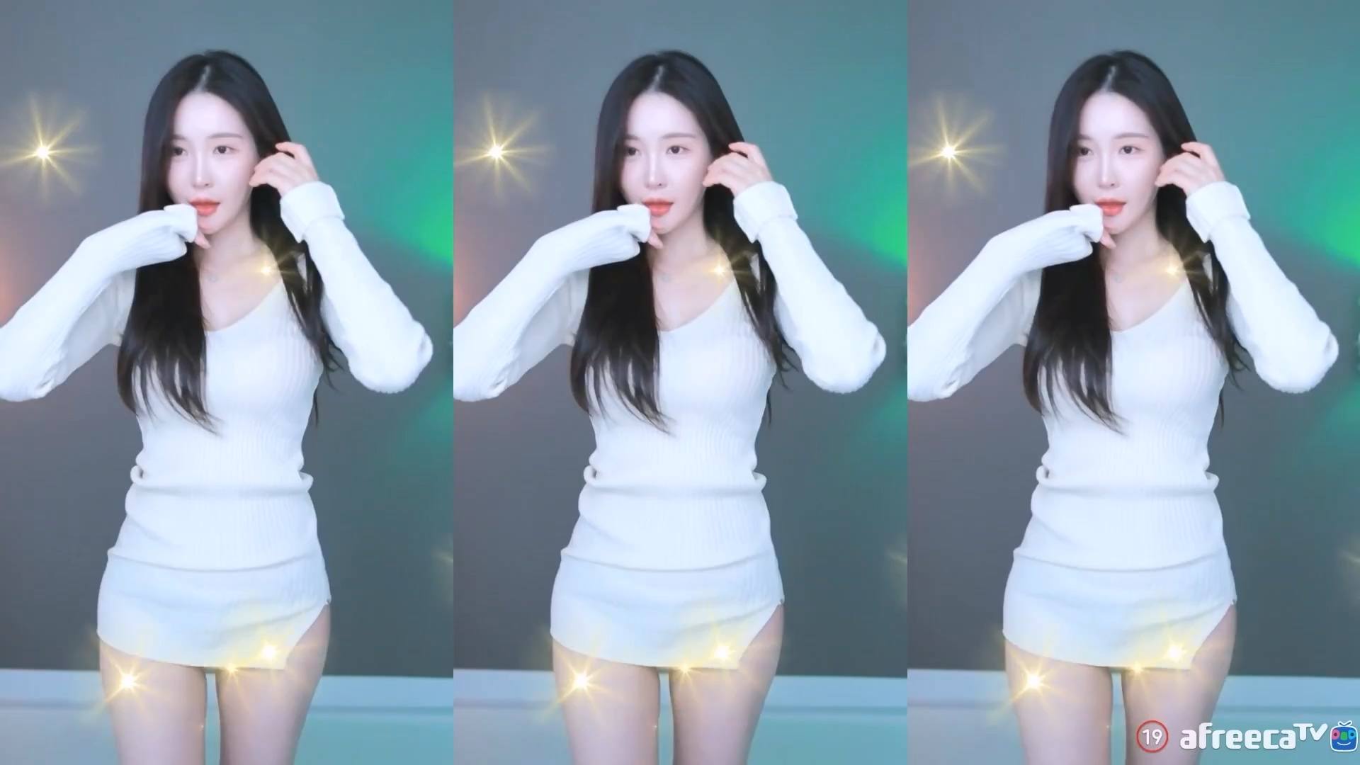 A woman looking directly into the camera with a playful expression